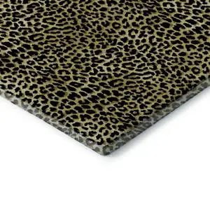 Photo of 8' Gold And Black Round Leopard Print Washable Indoor Outdoor Area Rug