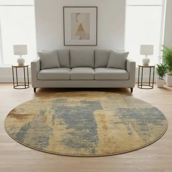 8' Gold And Blue Abstract Washable Round Rug With UV Protection Photo 2