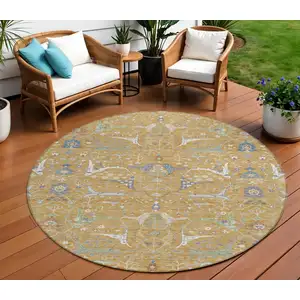 Photo of 8' Gold And Blue Round Floral Washable Indoor Outdoor Area Rug