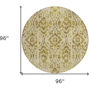 Photo of 8' Gold And Brown Round Floral Washable Indoor Outdoor Area Rug