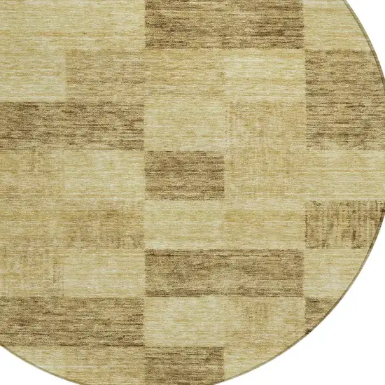 8' Gold And Brown Round Geometric Washable Indoor Outdoor Area Rug Photo 5