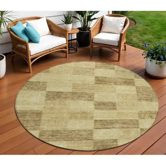 8' Gold And Brown Round Geometric Washable Indoor Outdoor Area Rug Photo 1