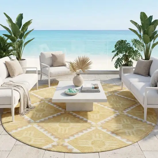 8' Gold And Brown Round Geometric Washable Indoor Outdoor Area Rug Photo 1