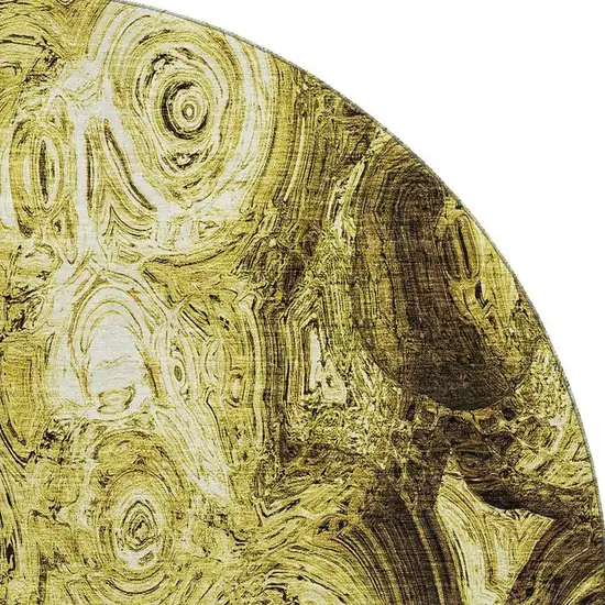 8' Gold And Chocolate Abstract Washable Round Rug With UV Protection Photo 3