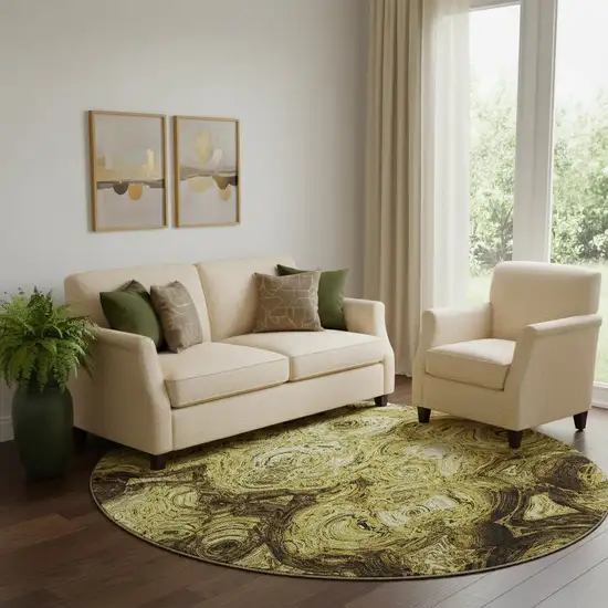 8' Gold And Chocolate Abstract Washable Round Rug With UV Protection Photo 1