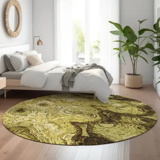 8' Gold And Chocolate Abstract Washable Round Rug With UV Protection Photo 4