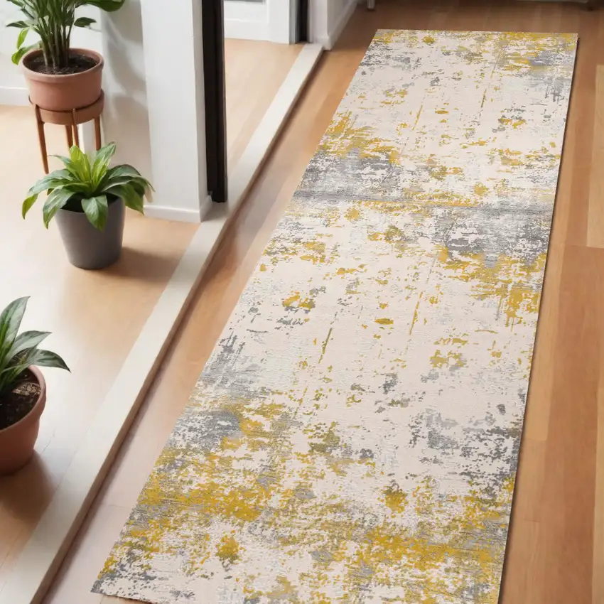 6' Gold And Gray Abstract Runner Rug Photo 1