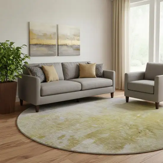8' Gold And Gray Abstract Washable Round Rug With UV Protection Photo 1