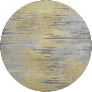 Photo of 8' Gold And Gray Abstract Washable Round Rug With UV Protection