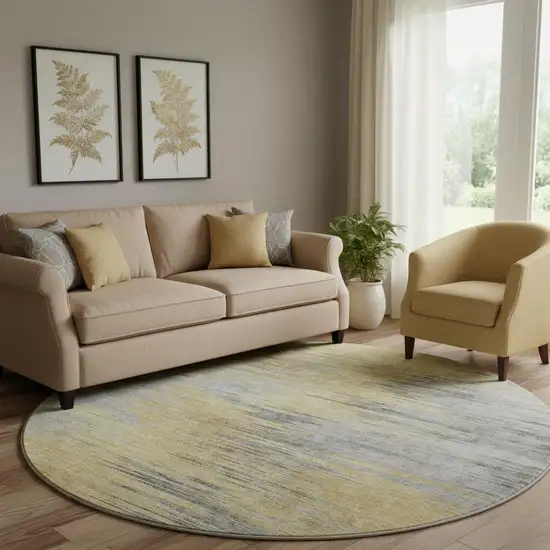 8' Gold And Gray Abstract Washable Round Rug With UV Protection Photo 1