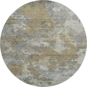 Photo of 8' Gold And Gray Abstract Washable Round Rug With UV Protection