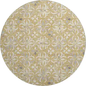 Photo of 8' Gold And Gray Floral Washable Round Rug With UV Protection