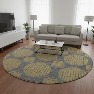 Photo of 8' Gold And Gray Geometric Washable Round Rug With UV Protection