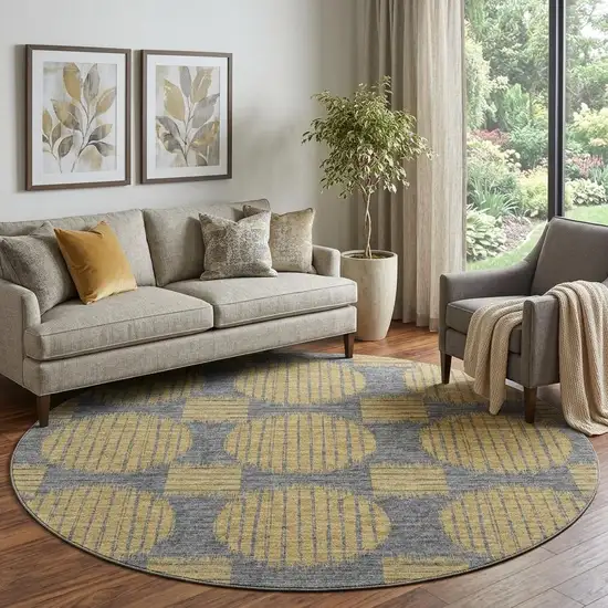 8' Gold And Gray Geometric Washable Round Rug With UV Protection Photo 1