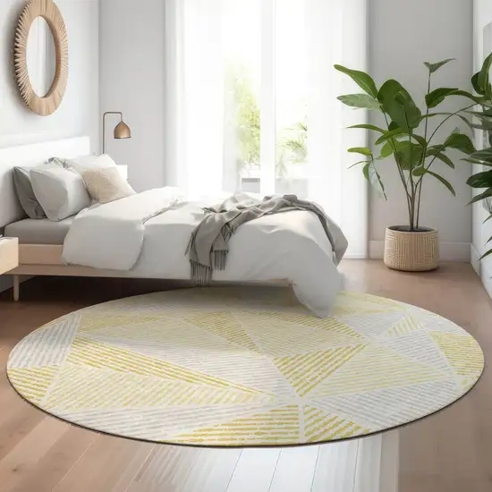 8' Gold And Gray Geometric Washable Round Rug With UV Protection Photo 5