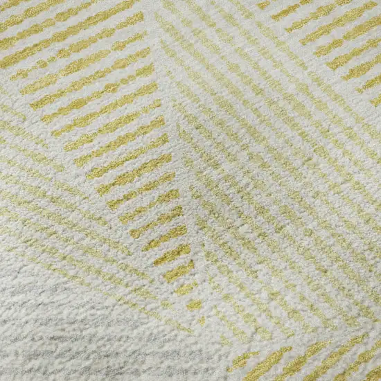 8' Gold And Gray Geometric Washable Round Rug With UV Protection Photo 9