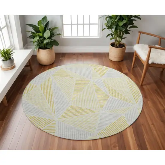 8' Gold And Gray Geometric Washable Round Rug With UV Protection Photo 2
