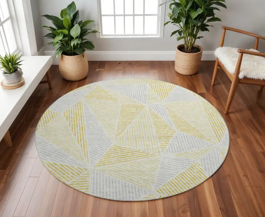 8' Gold And Gray Geometric Washable Round Rug With UV Protection Photo 2
