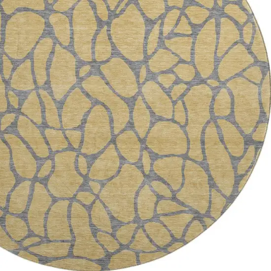 8' Gold And Gray Geometric Washable Round Rug With UV Protection Photo 2
