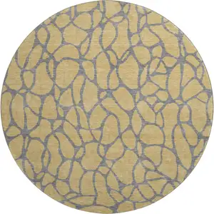 Photo of 8' Gold And Gray Geometric Washable Round Rug With UV Protection