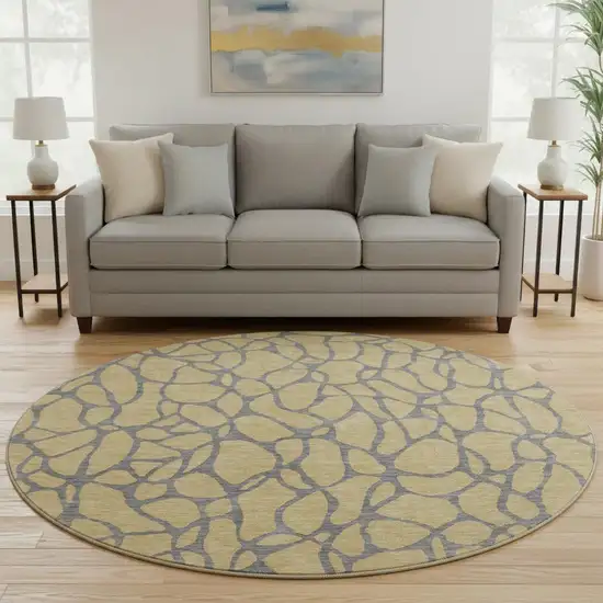 8' Gold And Gray Geometric Washable Round Rug With UV Protection Photo 2