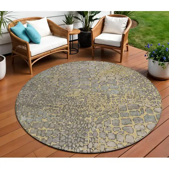 8' Gold And Gray Round Abstract Washable Indoor Outdoor Area Rug Photo 1