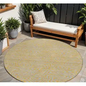 Photo of 8' Gold And Gray Round Abstract Washable Indoor Outdoor Area Rug