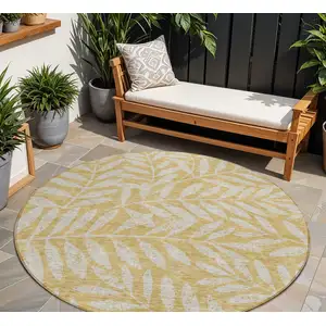 Photo of 8' Gold And Gray Round Floral Washable Indoor Outdoor Area Rug