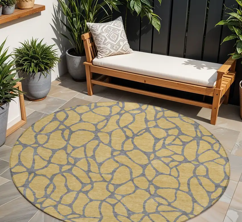 8' Gold And Gray Round Geometric Washable Indoor Outdoor Area Rug Photo 1