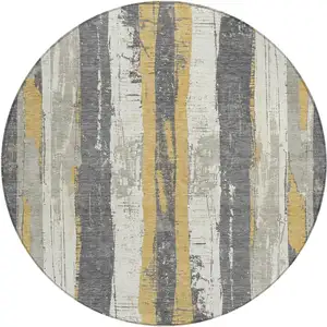 Photo of 8' Gold And Gray Round Striped Washable Indoor Outdoor Area Rug