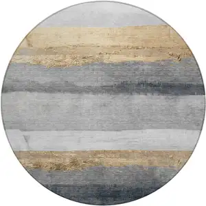 Photo of 8' Gold And Gray Round Striped Washable Indoor Outdoor Area Rug
