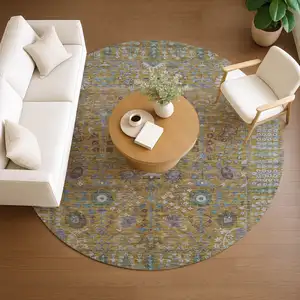 Photo of 8' Gold And Green Round Floral Washable Indoor Outdoor Area Rug