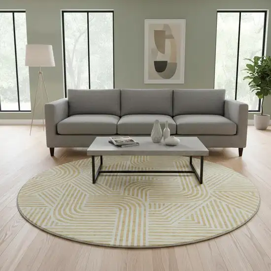 8' Gold And Ivory Abstract Geometric Washable Round Rug With UV Protection Photo 2