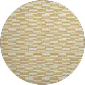 Photo of 8' Gold And Ivory Abstract Geometric Washable Round Rug With UV Protection