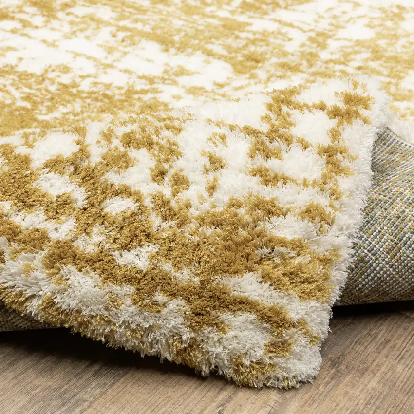 8' Gold And Ivory Abstract Runner Rug Photo 9