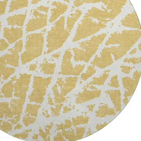 8' Gold And Ivory Abstract Washable Round Rug With UV Protection Photo 3