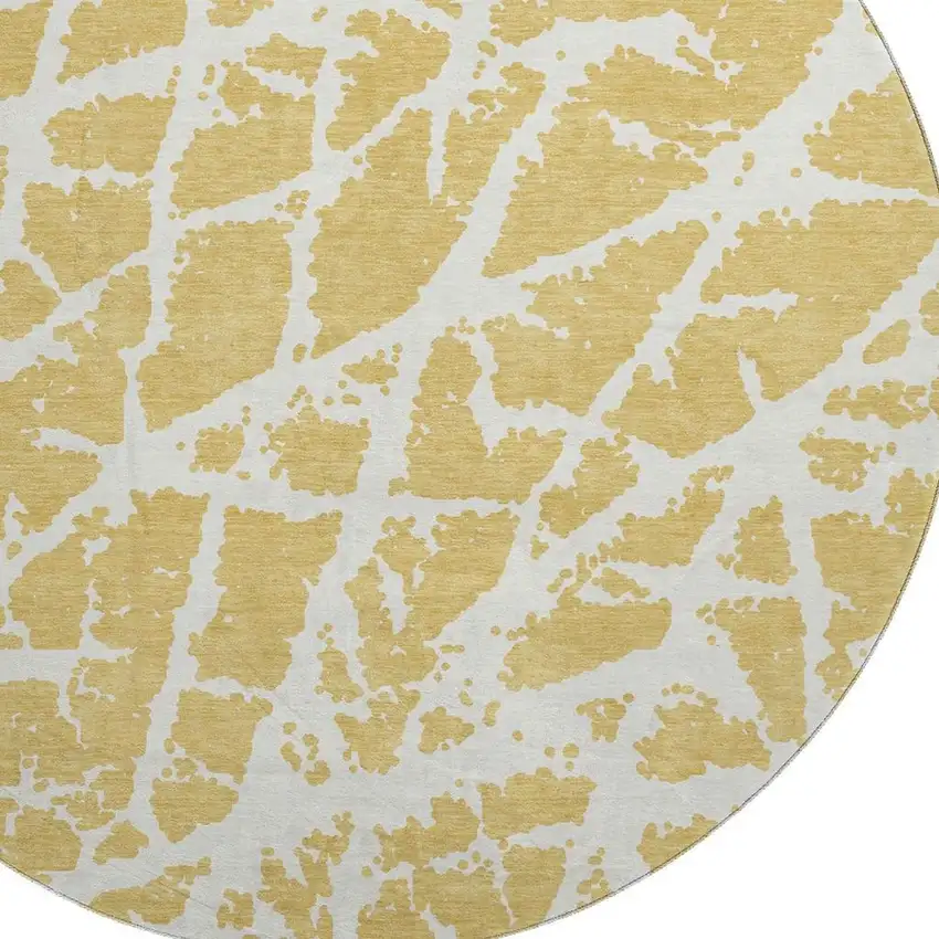 8' Gold And Ivory Abstract Washable Round Rug With UV Protection Photo 3