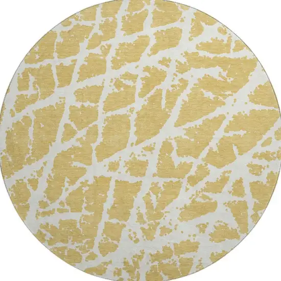 8' Gold And Ivory Abstract Washable Round Rug With UV Protection Photo 4