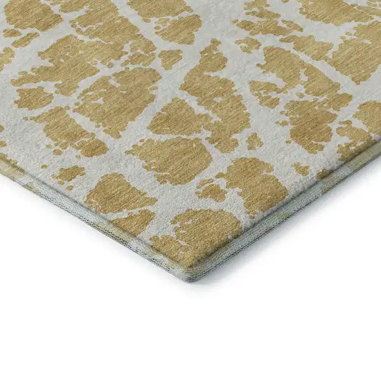 8' Gold And Ivory Abstract Washable Round Rug With UV Protection Photo 7