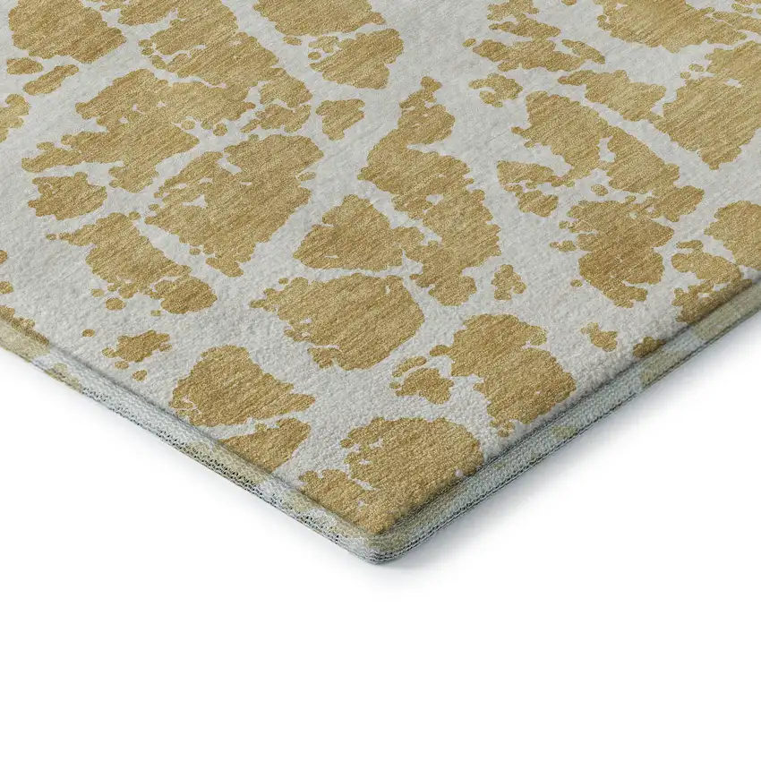 8' Gold And Ivory Abstract Washable Round Rug With UV Protection Photo 7