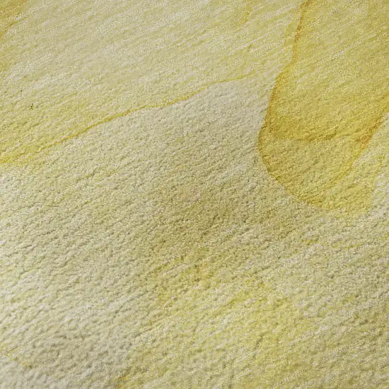 8' Gold And Ivory Abstract Washable Round Rug With UV Protection Photo 9