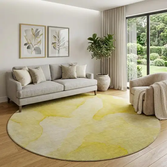 8' Gold And Ivory Abstract Washable Round Rug With UV Protection Photo 1