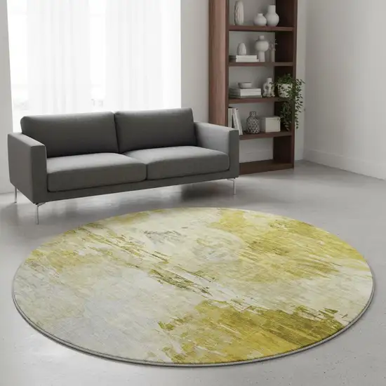 8' Gold And Ivory Abstract Washable Round Rug With UV Protection Photo 2