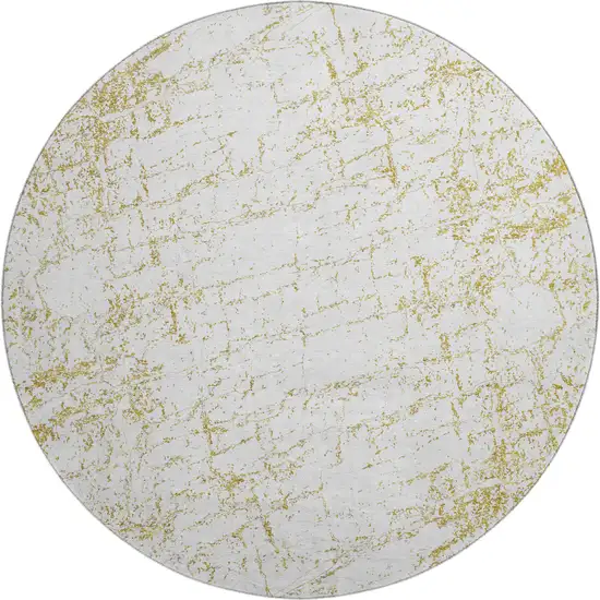 8' Gold And Ivory Abstract Washable Round Rug With UV Protection Photo 1