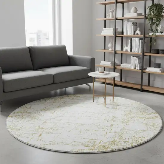 8' Gold And Ivory Abstract Washable Round Rug With UV Protection Photo 2