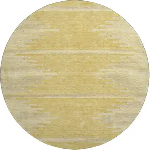 Photo of 8' Gold And Ivory Abstract Washable Round Rug With UV Protection