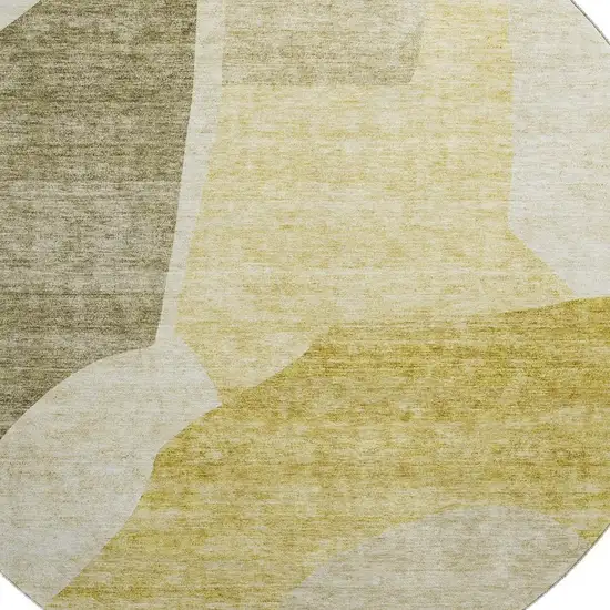8' Gold And Ivory Abstract Washable Round Rug With UV Protection Photo 2