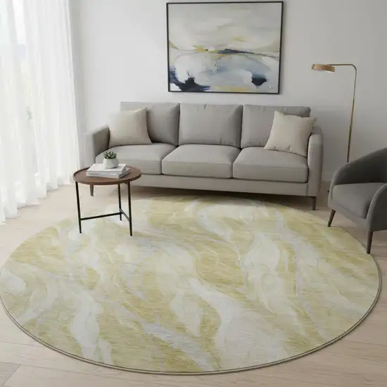 8' Gold And Ivory Abstract Washable Round Rug With UV Protection Photo 2