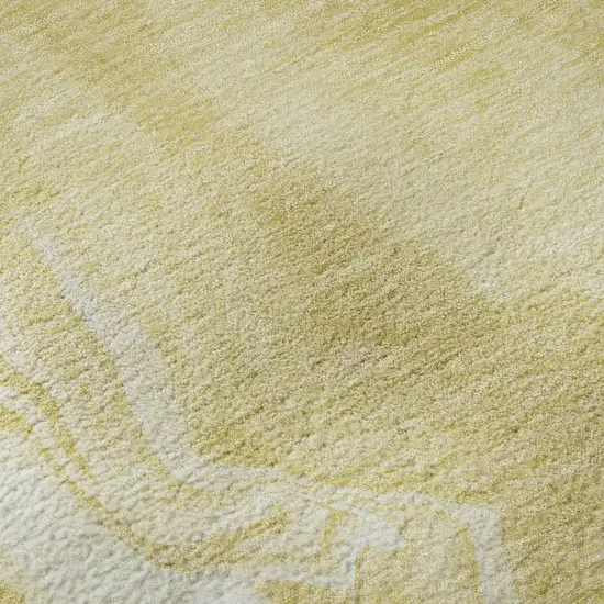 8' Gold And Ivory Abstract Washable Round Rug With UV Protection Photo 9