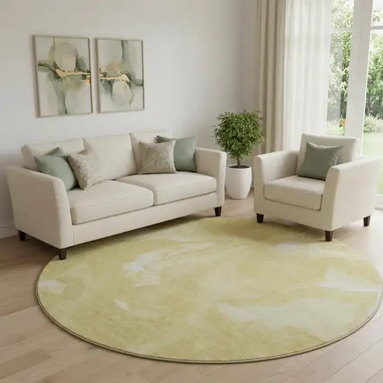 8' Gold And Ivory Abstract Washable Round Rug With UV Protection Photo 1